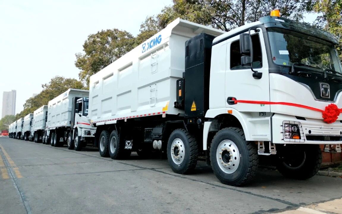 星空官网纯电动自卸车列队出海，助力当地煤炭运输绿色转型